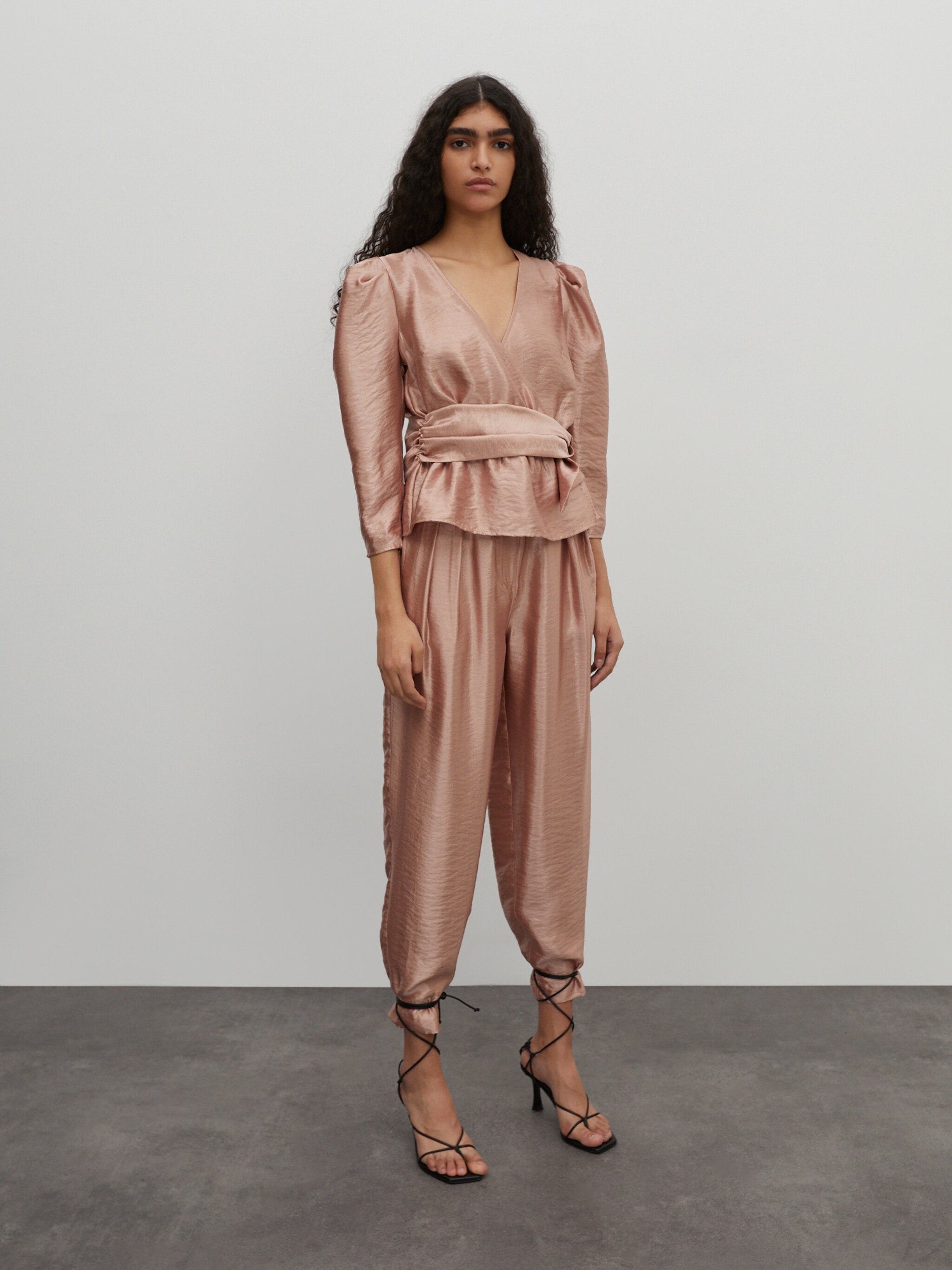 EDITED Producten Bandplooibroek 'Rea shine' Rosé