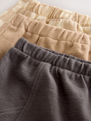 Next Tapered Housut värissä beige