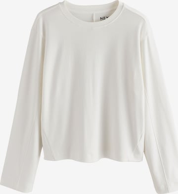 Tricou de la Next pe alb: față