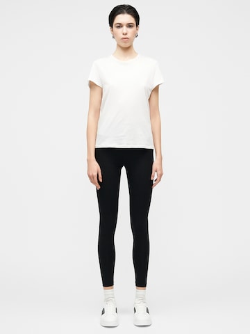Skinny Pantalon de sport EA7 Emporio Armani en noir