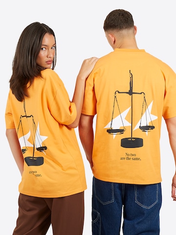 T-Shirt Legacy Studios en orange : devant
