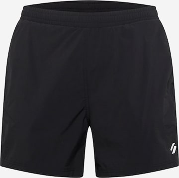 Regular Pantaloni sport de la Superdry pe negru: față