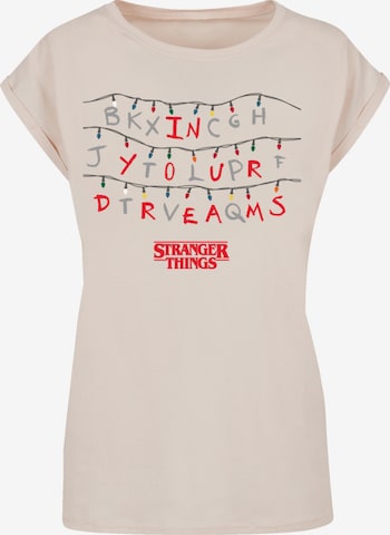 F4NT4STIC T-Shirt 'Stranger Things In Your Dreams Netflix TV Series' in Beige: Vorderseite