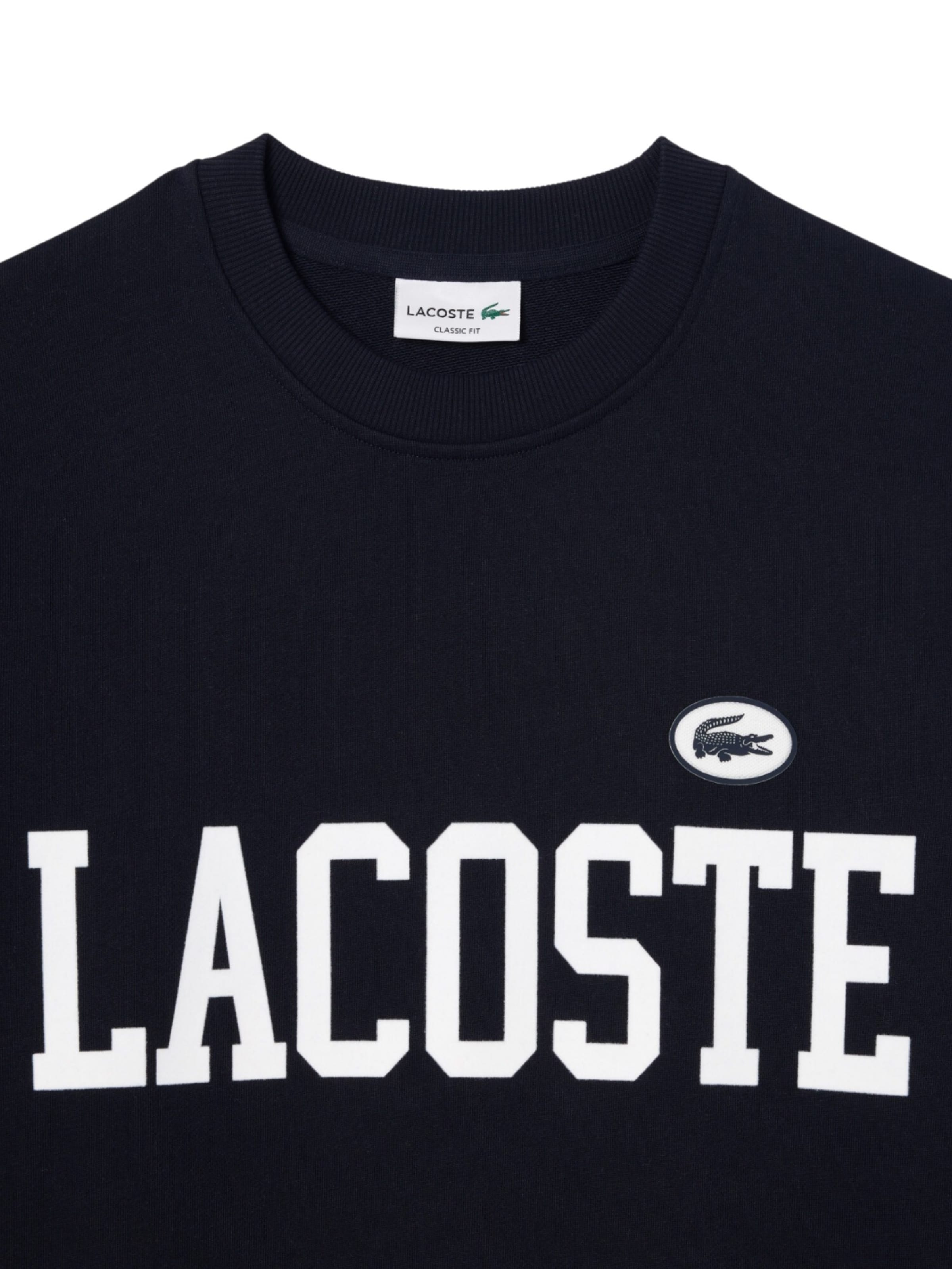 LACOSTE Sweatshirt i blå