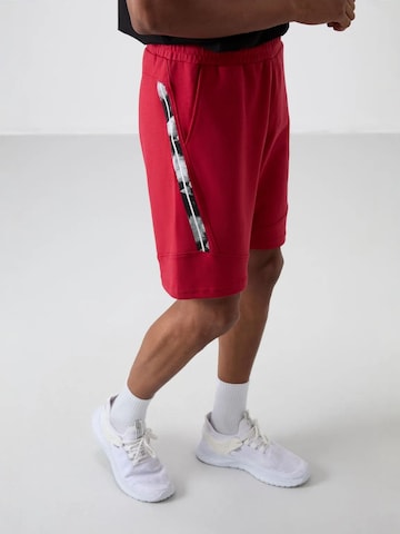 Regular Pantalon Tommy Life en rouge