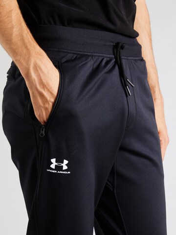 UNDER ARMOUR Zwężany krój Spodnie sportowe w kolorze czarny