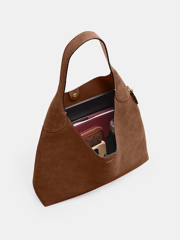 COACH Наплечная сумка в Коричневый