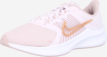 NIKE - Zapatillas de running 'Downshifter 11' en rosa: frente