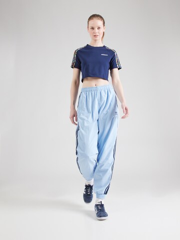 ADIDAS ORIGINALS Zwężany krój Spodnie w kolorze niebieski