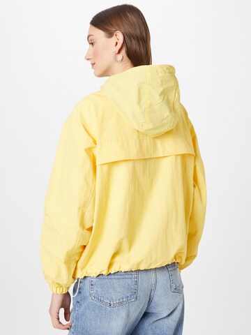 Tommy Jeans Between-Season Jacket 'Chicago' in Yellow