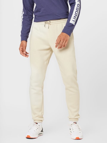 UNDER ARMOUR Regular Workout Pants in White: front