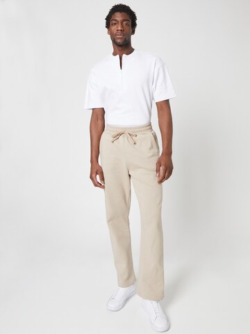 Loosefit Pantalon ABOUT YOU x Louis Darcis en beige