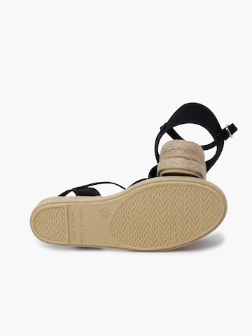 Pisamonas - Sandalias en negro