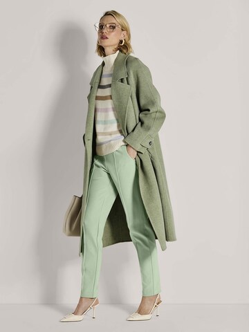 MADELEINE Tussenmantel in Groen