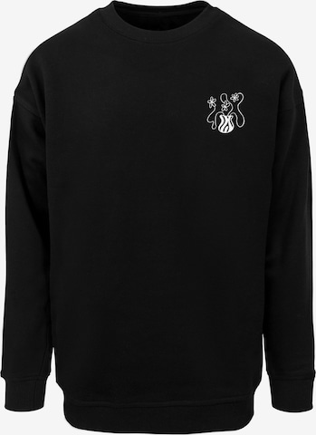 Merchcode Sweatshirt 'Flower Bloom' in Schwarz: Vorderseite