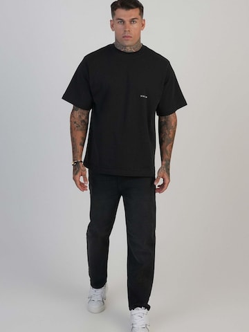 Tapered Jeans di SikSilk in nero: frontale