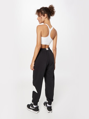 Effilé Pantalon 'Circa 50' Nike Sportswear en noir
