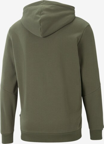 PUMA Sports sweatshirt in Green