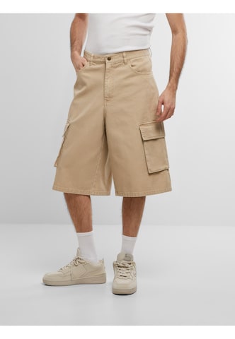 Loosefit Pantalon Karl Kani en beige