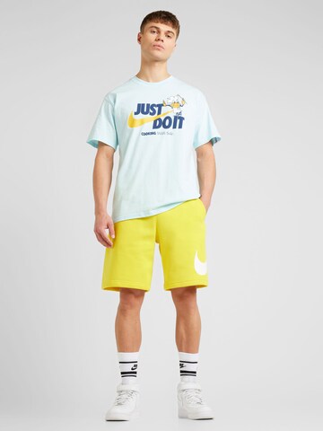 Nike Sportswear Štandardný strih Nohavice 'Club' - Žltá