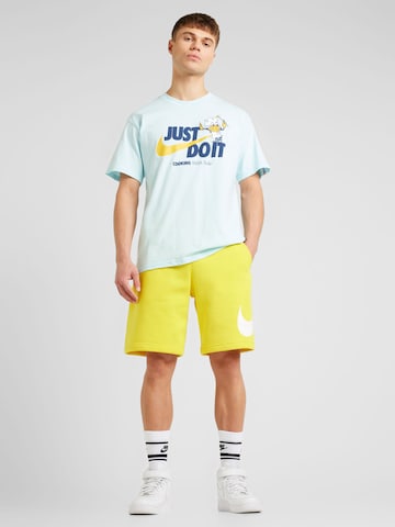 Nike Sportswear Regular Pants 'Club' in Yellow