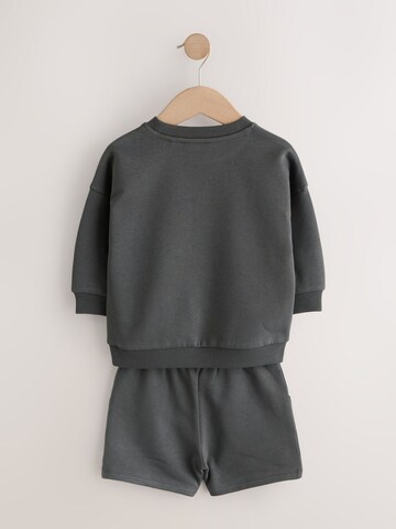 Next Träningsoverall i blå