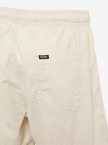 WRANGLER Loosefit Kalhoty – béžová