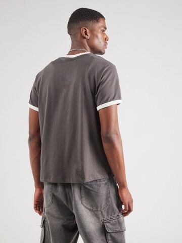 WEEKDAY Bluser & t-shirts i grå