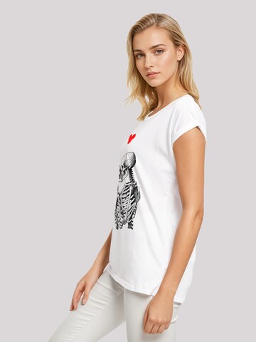 T-shirt 'Love is all you need' F4NT4STIC en blanc