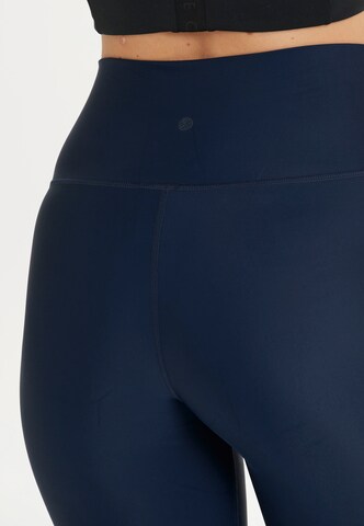 Athlecia Skinny Sportbroek 'Cadidell' in Blauw