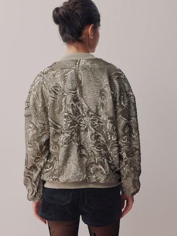 Next Välikausitakki värissä harmaa