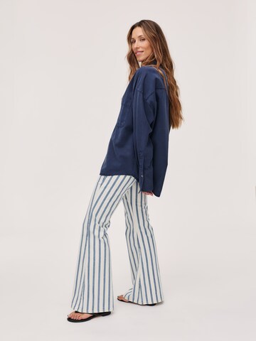 Kamila Šikl Flared Jeans 'Striped flared jeans' in Wit