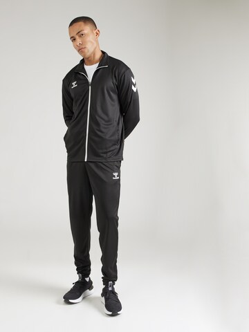 Completo per l'allenamento di Hummel in nero: frontale