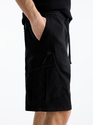 Pull&Bear Ohlapna forma Kargo hlače | črna barva