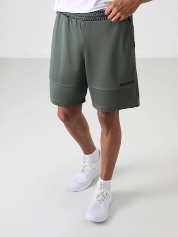 Regular Pantalon de sport Tommy Life en vert : devant