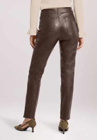 Cartoon Loose fit Trousers in Brown