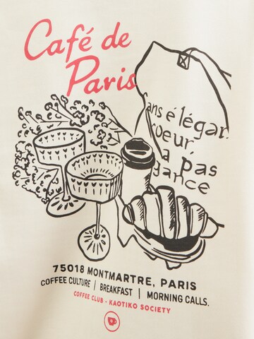 Kaotiko Μπλούζα φούτερ 'PARIS COFFEE' σε μπεζ