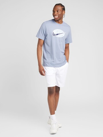 Tricou 'SWOOSH' de la Nike Sportswear pe albastru