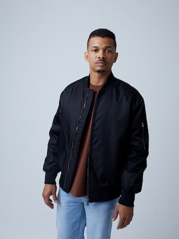 ABOUT YOU x Benny Cristo Between-Season Jacket 'Christos' in Black: front