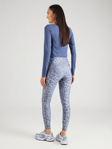 Skinny Pantaloni sportivi 'France' di Athlecia in blu