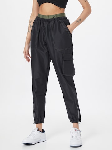 Tapered Pantaloni de la Reebok pe negru: față