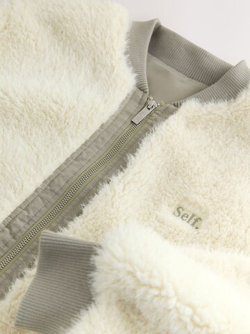 Giacca di pile di self. in bianco