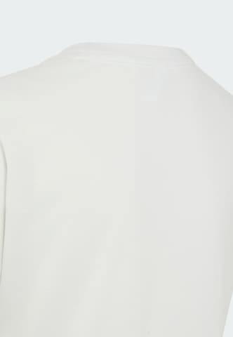 ADIDAS SPORTSWEAR - Camisa funcionais em branco