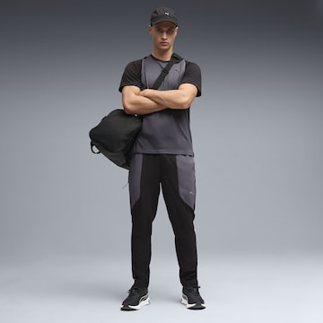 PUMA Regular Sportbroek 'Flex' in Zwart