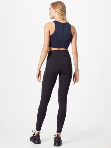 Skinny Pantaloni sportivi di aim'n in nero