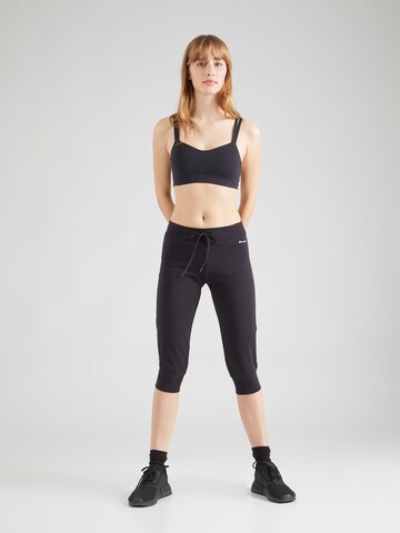 Effilé Pantalon de sport Champion Authentic Athletic Apparel en noir