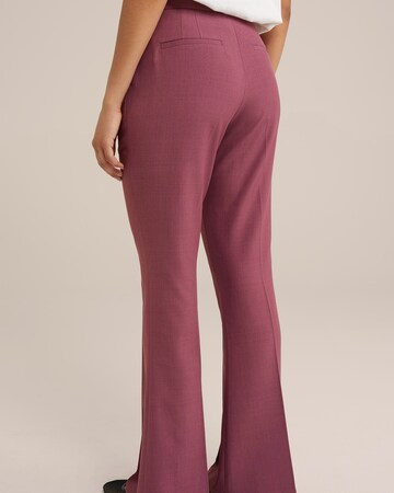 WE Fashion - Flared Calças com vincos em rosa