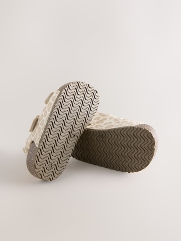 Sandale de la Next pe bej