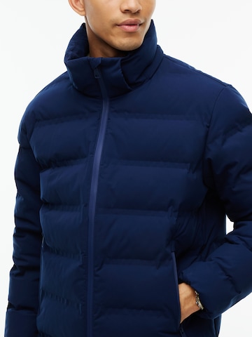 TOMMY HILFIGER Χειμερινό μπουφάν 'TECH HEAT' σε μπλε