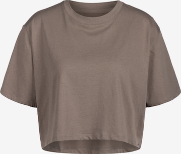 T-shirt fonctionnel UNDER ARMOUR en beige : devant